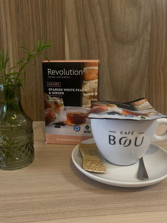 Revolution ADORE Te negro con melocotón y jengibre